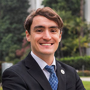 Professional headshot in front of the California State Capitol