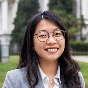 Professional headshot in front of the California State Capitol