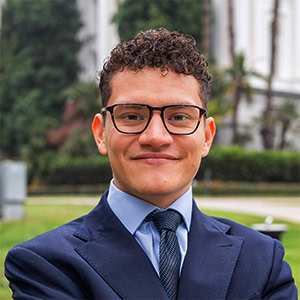 Professional headshot in front of the California State Capitol