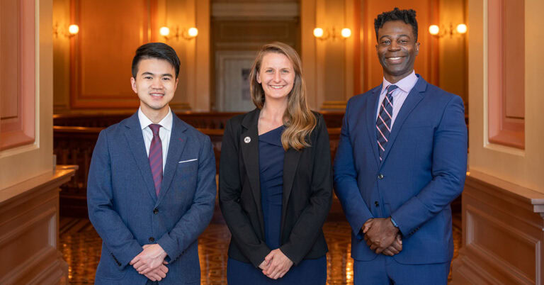 Professional group photo inside the California State Capitol dome.