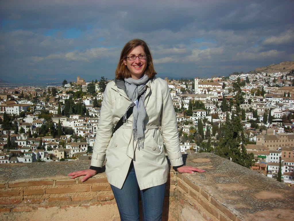 Jen Chase atop of the famed Alhambra palace, overlooking the city of Granada in Andalusia, Spain. Image courtesy of Jen Chase.
