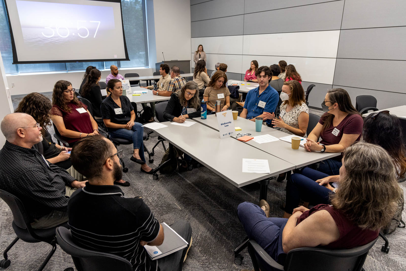 Attendees participate in a breakout session.