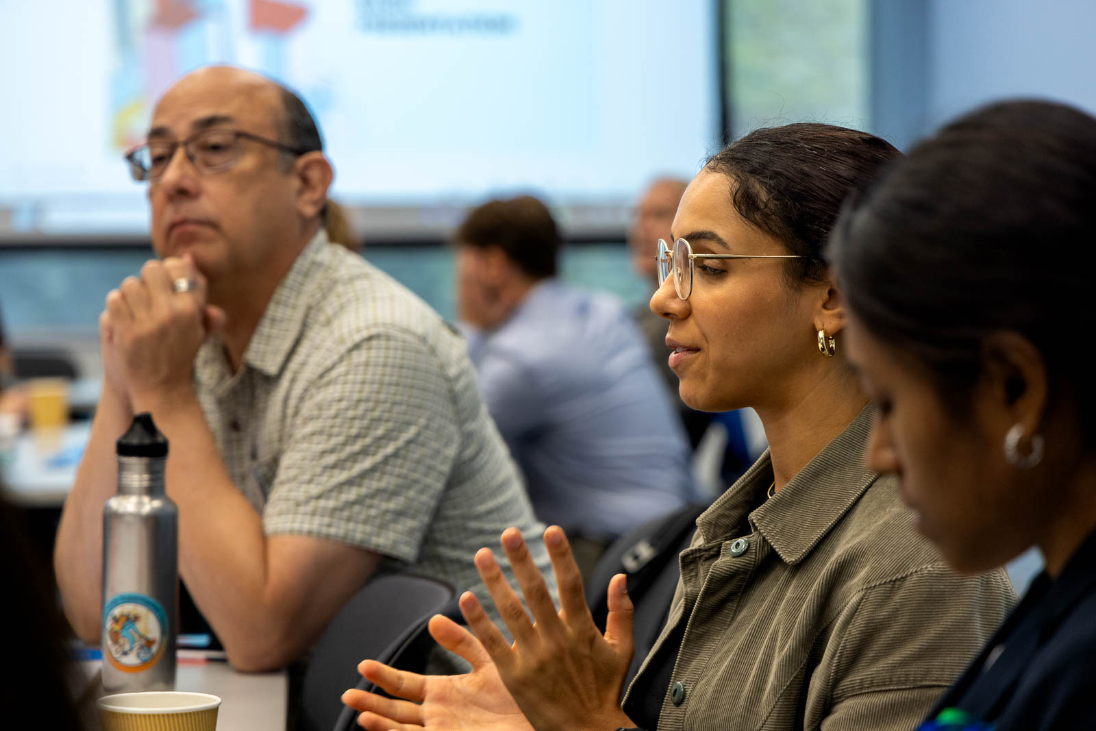 Attendees participate in a breakout session.
