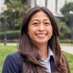 Professional headshot in front of the California State Capitol
