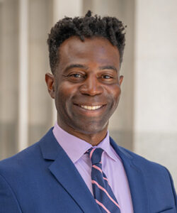 Professional headshot of Justin Norman.