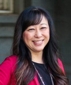 Headshot in formal wear outside the Capitol