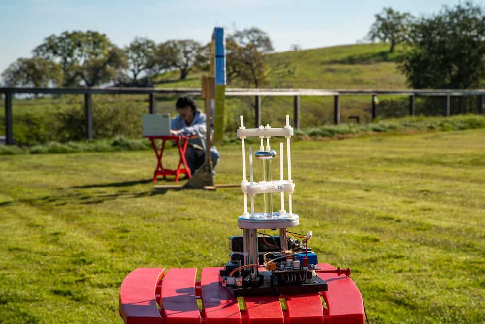  A SLAC researcher working on a compact, low-frequency antenna, for communicating over long distances and through potential obstructions. (Credit: Dawn Harmer/SLAC)