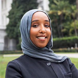 Professional headshot in front of the California State Capitol